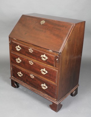 A mahogany bureau of small proportions, the fall front revealing a well fitted interior above 3 long drawers with brass swan neck drop handles, raised on bracket feet 26"h x 29"w x 17 1/2"d 