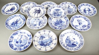14 Wedgwood blue and white Christmas plates decorated with Victorian scenes