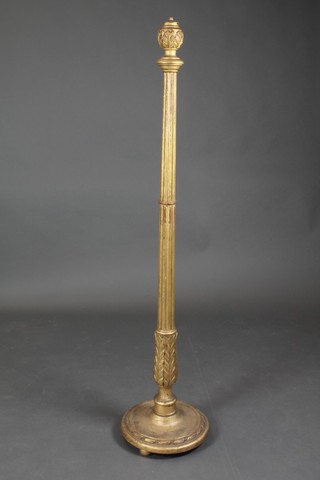 A gilt painted reeded standard lamp 