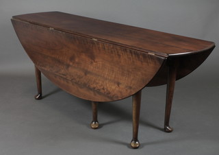 A Georgian style oval drop flap hunt/wake table, raised on 6 club supports 30"h 28", the top 20" when closed, 60" when open 