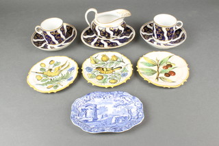 A 19th Century English part tea set comprising 2 cups, 2 saucers, a sauceboat and stand, the white ground decorated with blue and gilt wavy bands of flowers, 3 Continental dishes and a Copeland Spode dish 