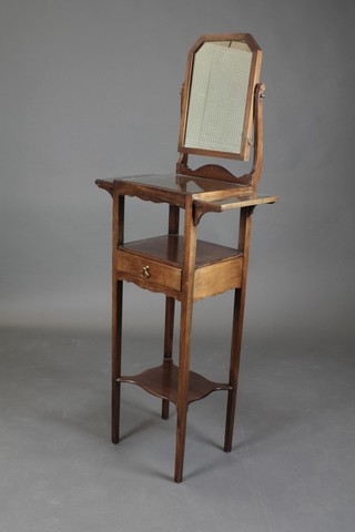 A 19th Century mahogany gentleman's shaving stand with shaped plate mirror, the base fitted a drawer on square tapering supports with undertier 59"h x 22 1/2"w x 13"d 