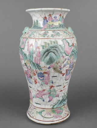 A 19th Century famille rose crackle glazed vase decorated with a battle scene with lion ring handles 14" 