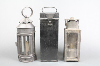 A 19th Century metal square iron and carbide camping lantern complete with metal carrying case together with a candle lantern  
