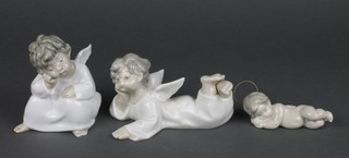 A Lladro figure of a sleeping angel with gilt metal halo 3 1/2", ditto reclining angel 5", ditto seated angel 4"