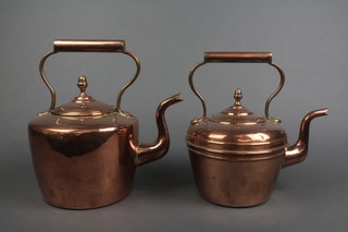 A Victorian circular copper kettle with acorn finial, the base marked L and 1 other copper kettle 