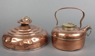 A circular copper and brass Jerrison Picnic kettle 5" (some dents) together with a circular copper and brass foot warmer 9" (some dents) 