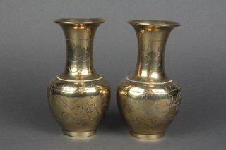 A pair of Chinese polished bronzed club shaped vases with floral decoration 7" 