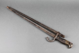 A pair of fire tongs formed from 2 chassepot bayonets, dated 1883 