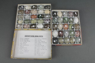 50 various carved hardstone specimen eggs contained in 2 boxes 