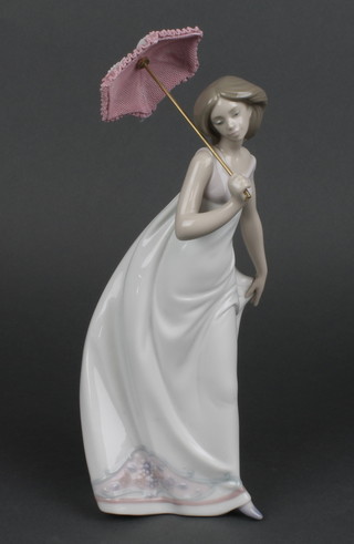 A 1995 Lladro Collectors Society figure of a lady with parasol 10" 