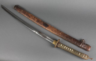 A 19th/20th Century Japanese Wakizashi sword with 22" blade, the tang signed on both sides and having 3 holes to it, with bronze tsuba and leather scabbard 