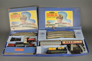 A Hornby Dublo electric train set EDG 17 comprising locomotive, 5 items of rolling stock, boxed together with a Hornby Dublo train set EDP 12, boxed 