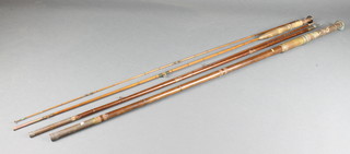 A 2 section Green Drake split cane fly rod together with a Henry Wilkes & Co 3 section mahogany fishing rod 