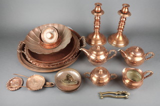 A pair of copper candlesticks 10", a 4 piece copper Chinese style tea service and other items of copper 