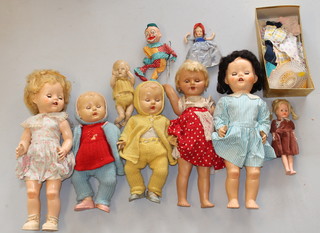 A Pedigree doll, a Rosebud doll and a collection of other dolls