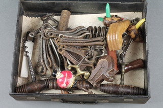 3 19th Century corkscrews, various bottle openers contained in a metal military issue first aid kit tin 