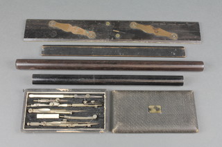 Stanley, a 19th Century ebony and brass parallel ruler, a geometry set, 2 rolling rulers and 1 other ruler