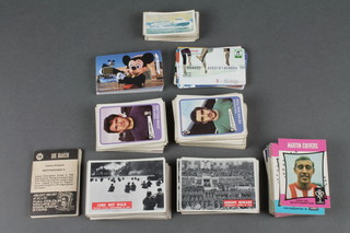 A collection of various phone cards and a collection of football cards 