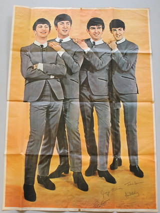 A Beatles 1960's colour poster depicting their 4 standing figures with facsimile signatures, marked to the bottom right hand corner Printed in England, 55" x 39 1/2" 