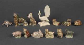 12 various Wade Whimsies - Alsatian 2", walking tortoise, seated cat, standing pig, rabbit (slight chip to ear), leaping salmon, hedgehog, owl, horse, dog and 2 dogs, together with a carved ivory figure of a peacock (wing f) 3" 