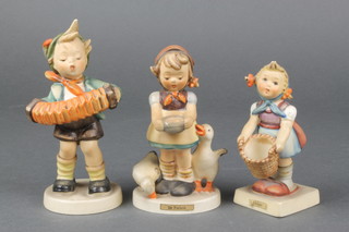 3 Hummel figures - The Helper 4", Be Patient 4 1/2" and boy with accordion 5 1/2" 