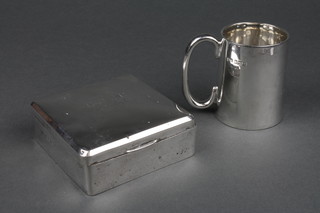 An Edwardian silver presentation beaker, Sheffield 1906 and a silver cigarette box