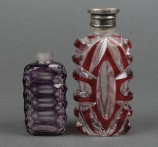 A red overlaid glass scent with plated mount, an amethyst coloured ditto