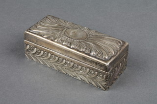 A Victorian repousse rectangular silver toilet box, London 1897