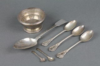 A silver sugar bowl, a table spoon, 3 dessert spoons and 2 mustard spoons 