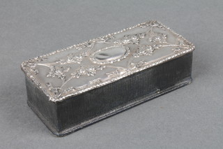 A repousse silver mounted leather stamp box with floral decoration 4", Birmingham 1894