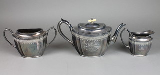 A silver plated presentation teaset with inscription dated 1912 together with a related photograph and cutting 