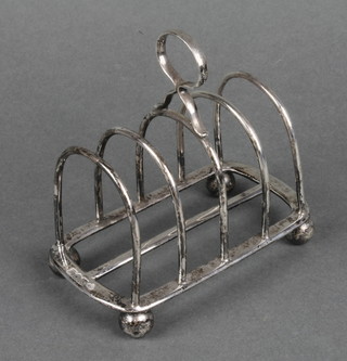 A silver 5 bar toast rack on ball feet, London 1927, approx 164 grams 