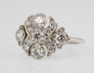 An 18ct white gold Art Deco style diamond ring, approx. 1.20ct size M