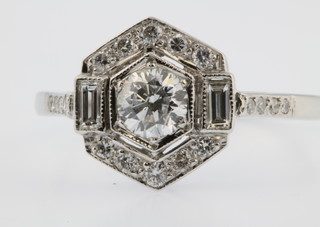 An 18ct white gold diamond cluster ring, size P, approx 0.5ct 