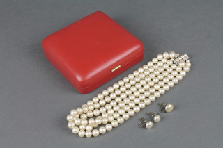 A 3 strand imitation pearl necklace and ear clips