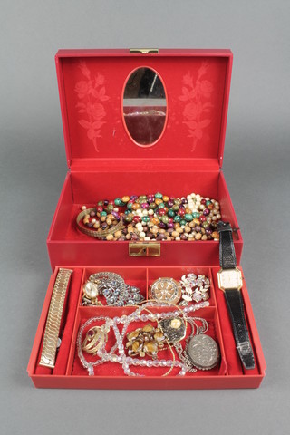 A silver locket and minor costume jewellery 