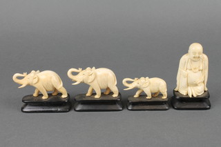 A carved ivory figure of seated Hotei 3", 3 carved elephants