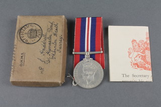 A boxed WWII British War medal 