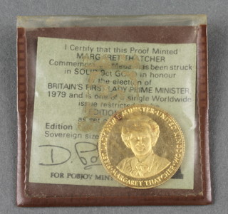 A 9ct gold Margaret Thatcher commemorative coin, approx 6 grams