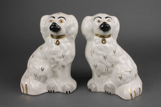 A pair of Staffordshire style spaniels 8" 