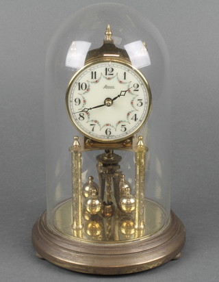 A German 400 day clock with enamelled dial and Roman numerals, complete with dome 