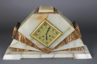 A French Art Deco 8 day striking mantel clock with gilt diamond shaped dial and Arabic numerals, contained in a 2 colour marble case 