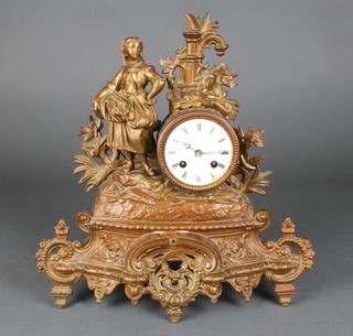 A French 19th Century 8 day striking clock with enamelled dial and Roman numerals contained in a gilt painted spelter case supported by a figure of a lady representing the harvest 