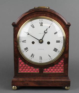 Smith, a Georgian striking bracket clock with 6 1/2" enamelled dial, Roman numerals, signed Smiths London, contained in an arched mahogany case with brass carrying handle, striking on a bell, the 5" engraved back plate marked Smiths London and with engraved pendulum