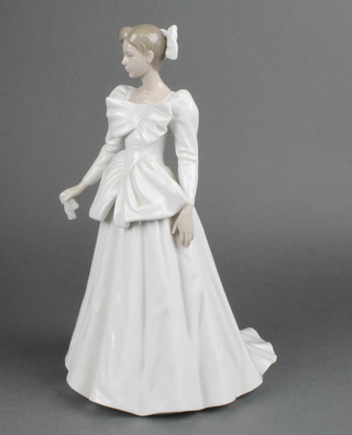 A Nao figure of a lady in a white gown 12", boxed