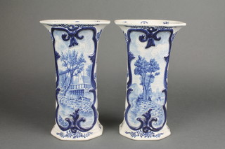 A pair of 20th Century octagonal Delft vases decorated with landscape views 9" 