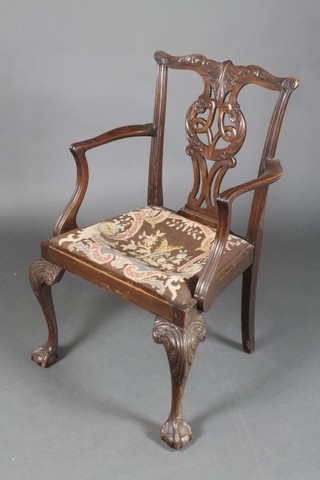 A Chippendale style mahogany slat back carver chair with vase shaped slat back and upholstered seat, raised on cabriole ball and claw supports