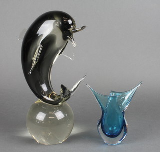 A 1970's Continental Art glass figure of a dolphin sitting on a ball 12" and a ditto turquoise vase 