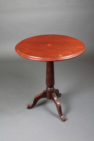 A circular mahogany wine table raised on pillar and tripod base 28"h x 14" diam. 